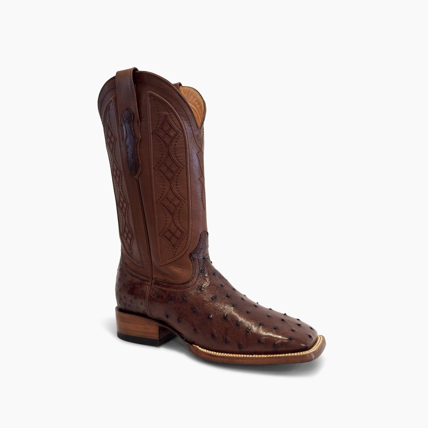 Don Pascual brown full quill ostrich square toe cowboy boot — three-quarter angle view showing full quill ostrich texture and stacked leather heel in chocolate brown