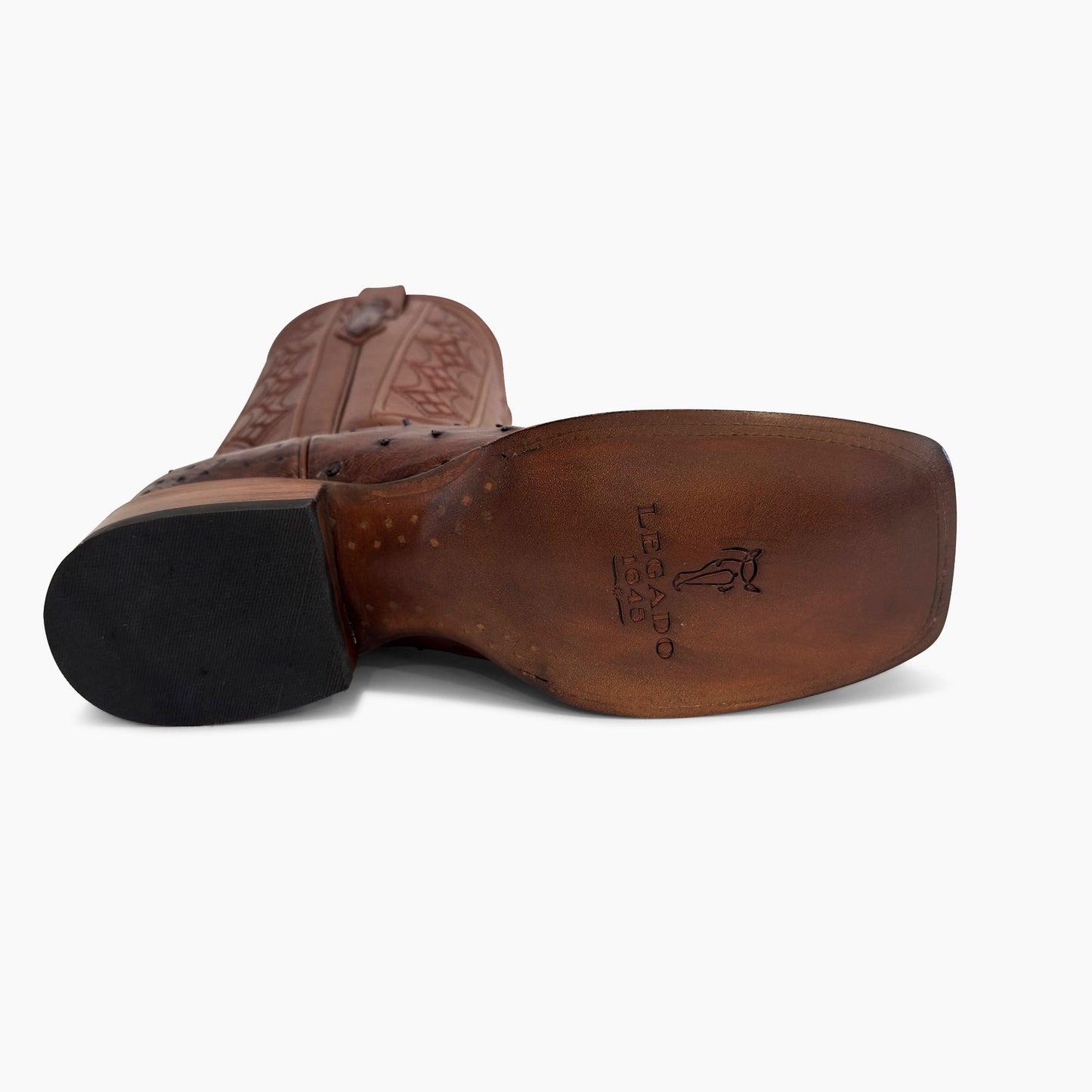 Don Pascual brown full quill ostrich square toe cowboy boot — leather sole showing Legado 1849 brand stamp and Goodyear welt construction