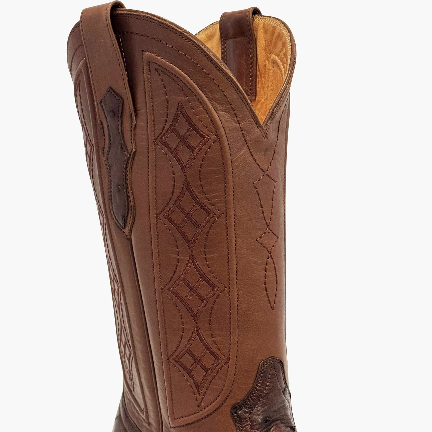Don Pascual brown full quill ostrich square toe cowboy boot — close-up of brown cowhide shaft showing full diamond stitch pattern and ostrich pull-tab inlay detail