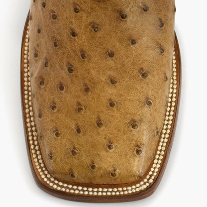 Don Pascual desert full quill ostrich square toe cowboy boot — close-up of square toe showing natural full quill ostrich texture and cream welt stitching in desert colorway