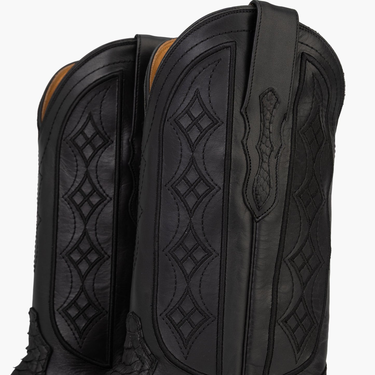 Don Pascual matte black python square toe cowboy boot — close-up of black cowhide shaft showing embossed diamond stitch pattern
