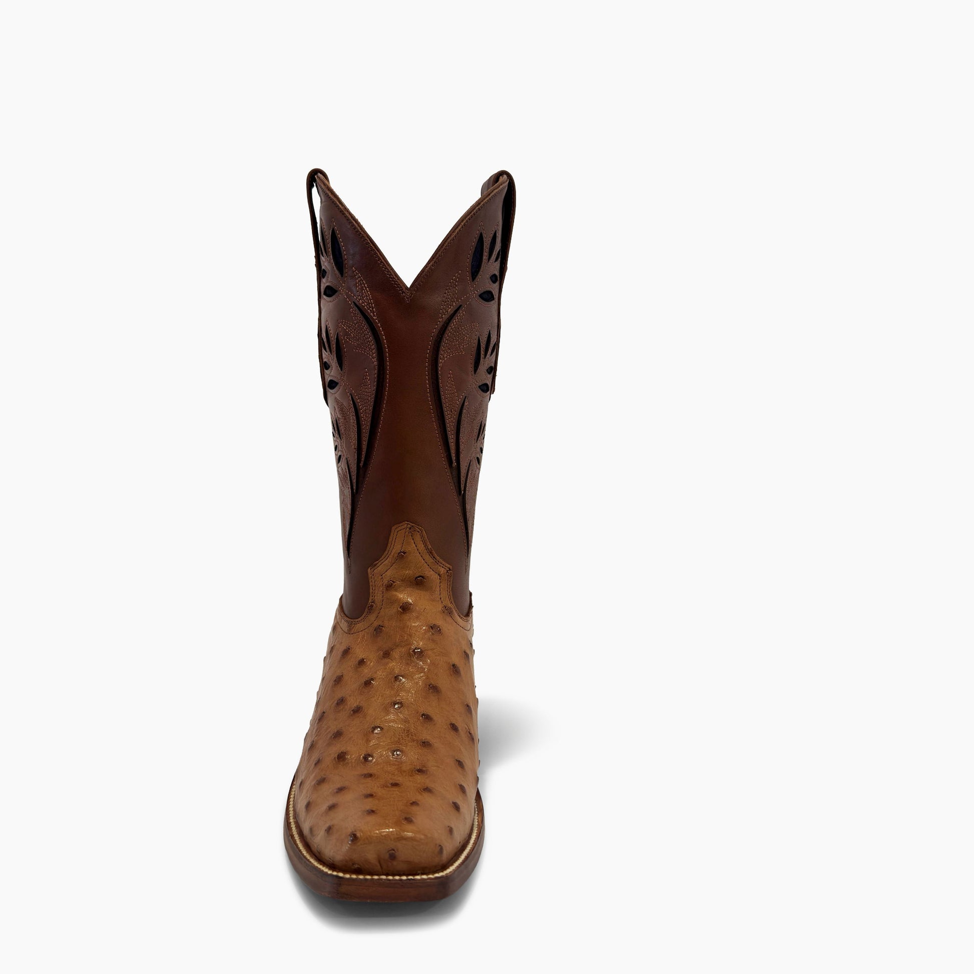 J Charles cognac full quill ostrich cutter toe cowboy boot — front view showing cutter toe shape and hand-cut floral perforated brown cowhide shaft