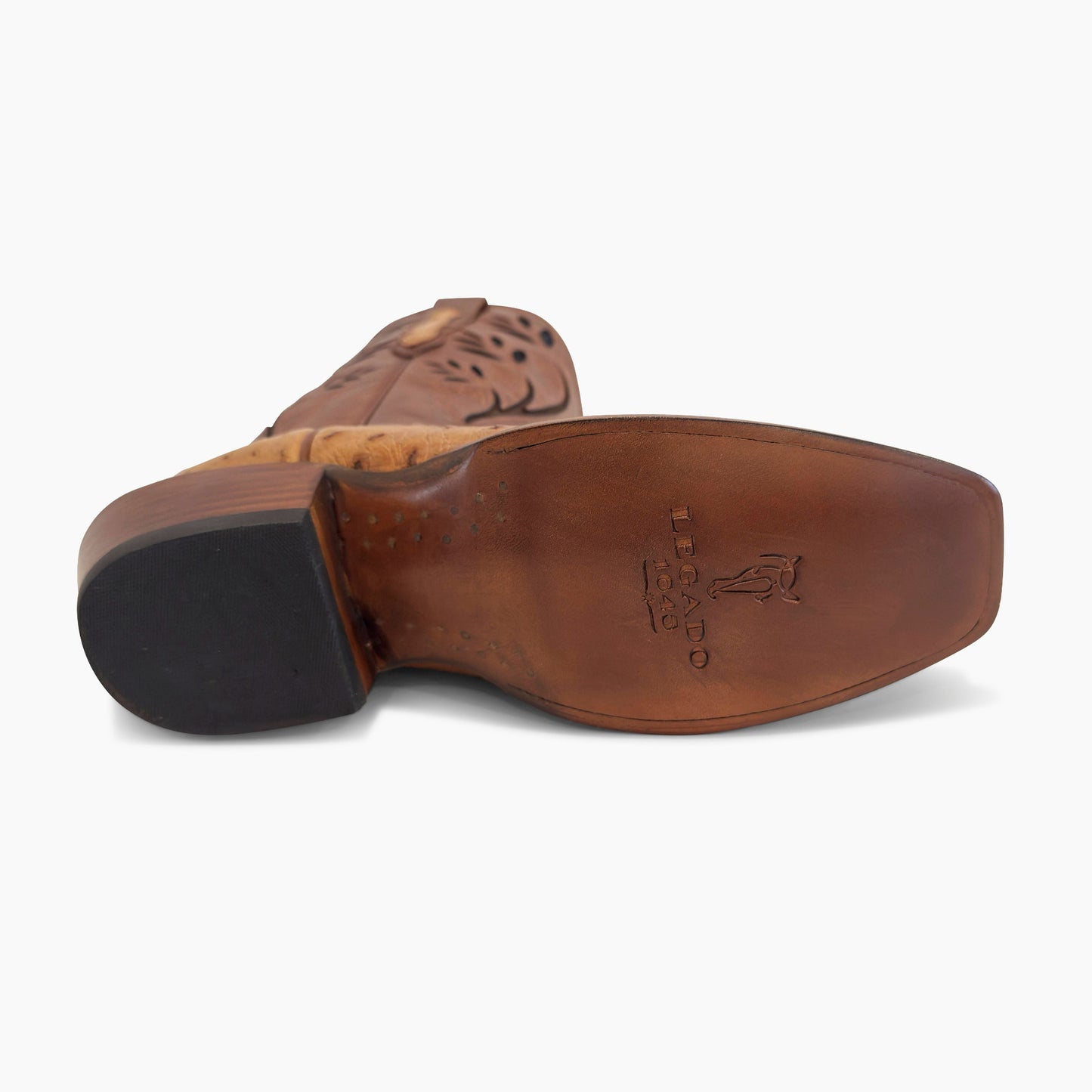 J Charles cognac full quill ostrich cutter toe cowboy boot — leather sole showing Legado 1849 brand stamp and Goodyear welt construction
